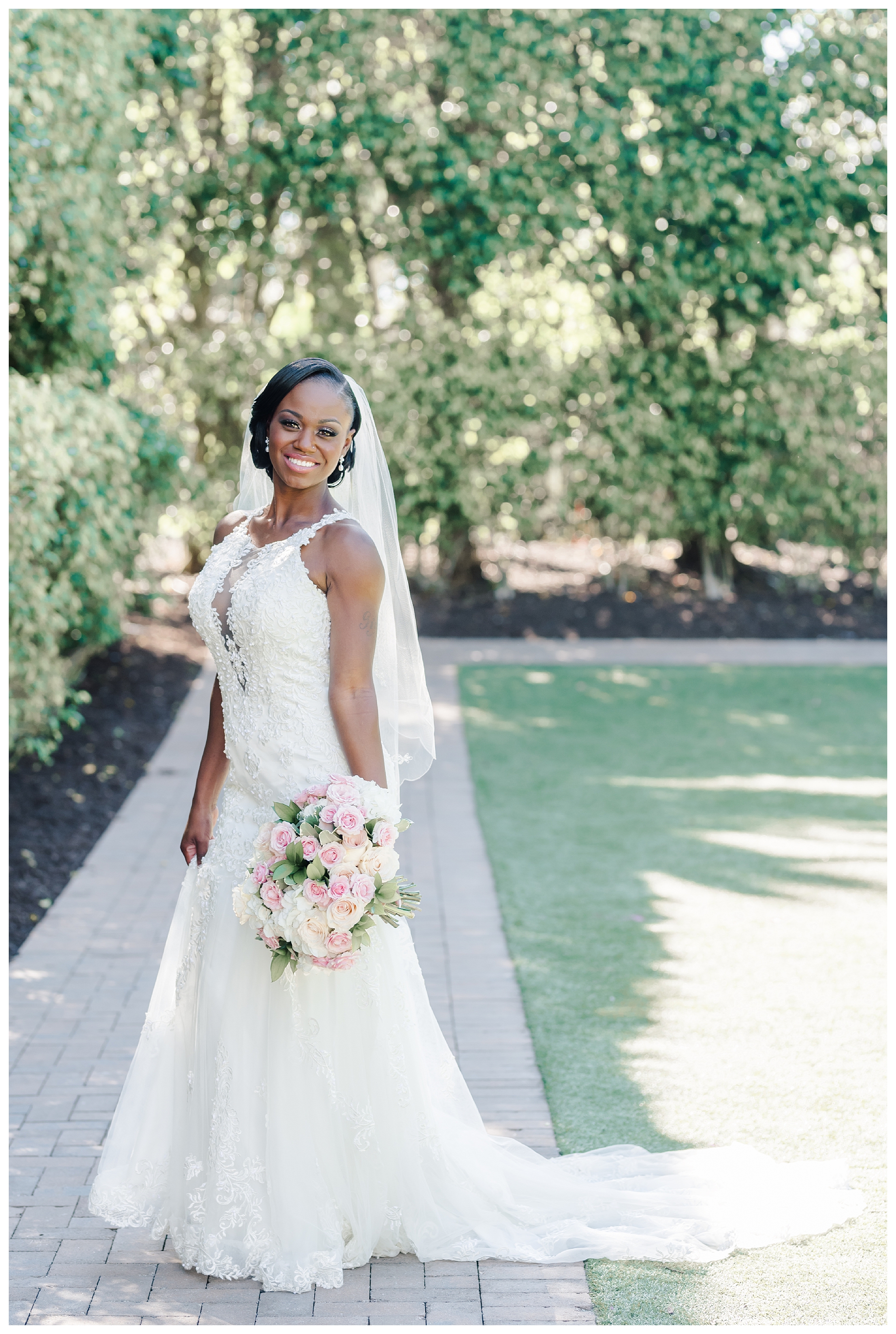 White lace wedding dress with veil and rose bouquet with blush accents | Jessica McCalla Photography
