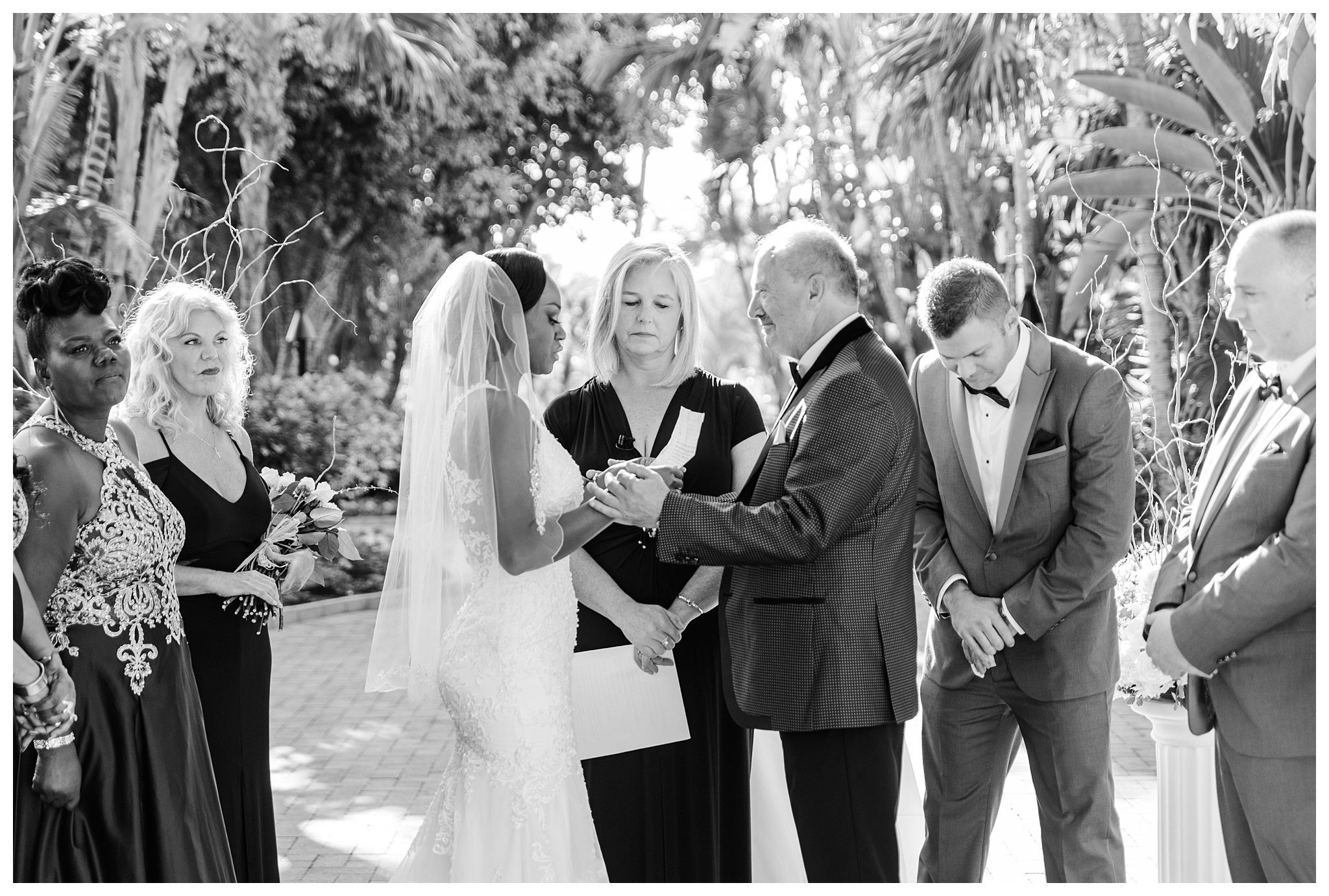 Wedding vows in the courtyard at Hyatt Regency Coconut Point by Florida wedding photographer Jessica McCalla Photography