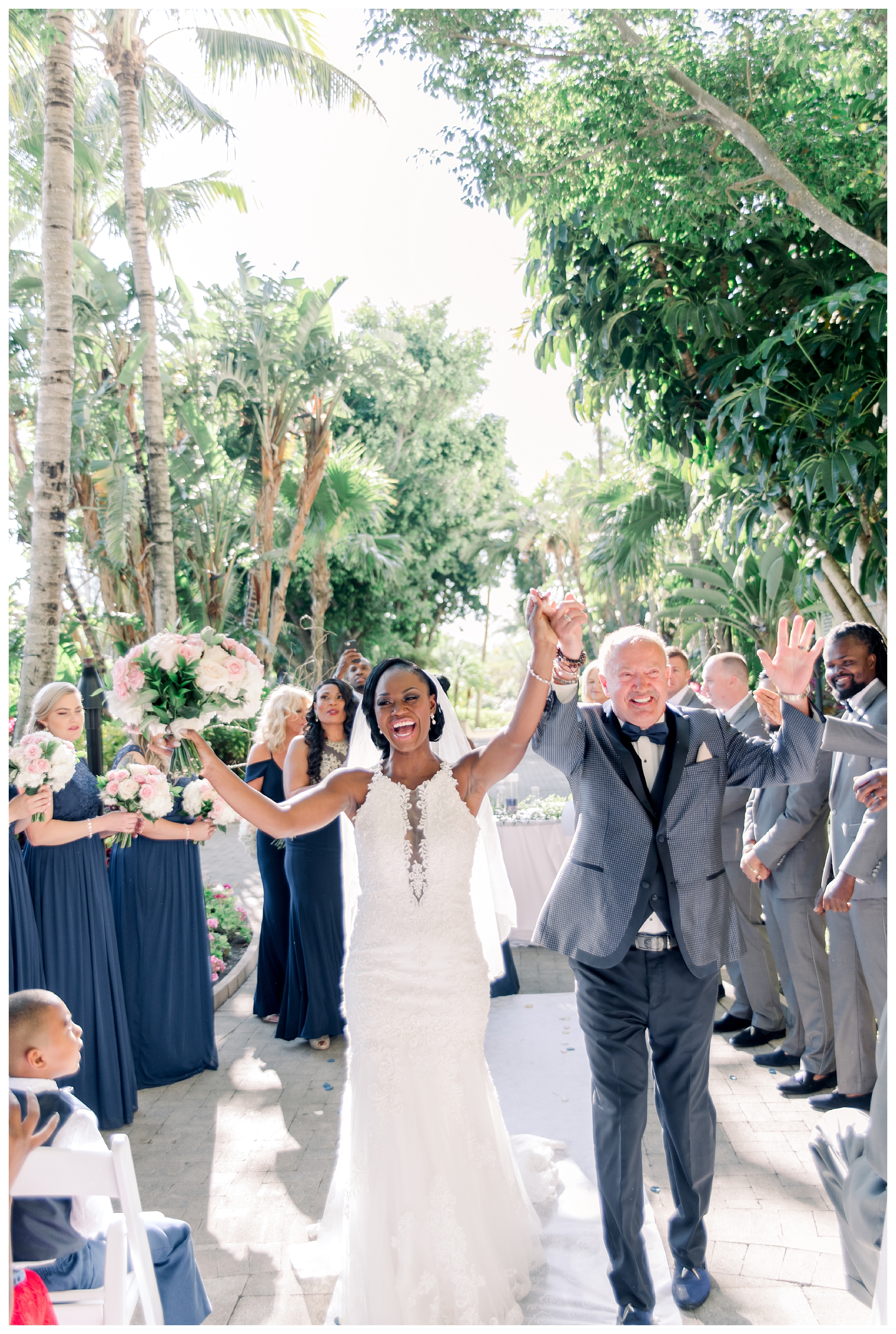 Wedding ceremony in the courtyard at the Hyatt Regency Coconut Point by Jessica McCalla Photography