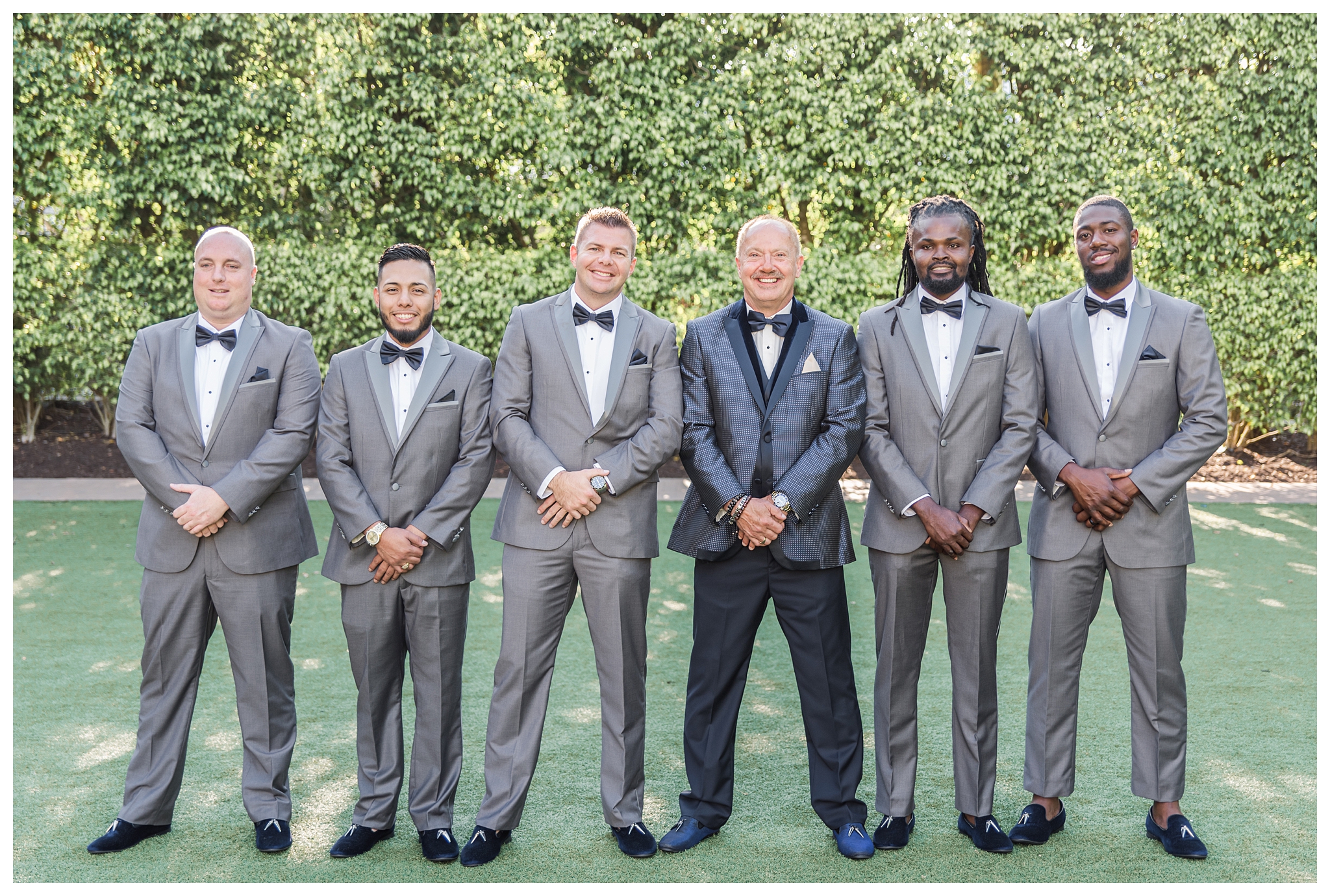 Groom with his groomsmen, navy and grey suits at the Hyatt Regency Coconut Point by Jessica McCalla Photography.