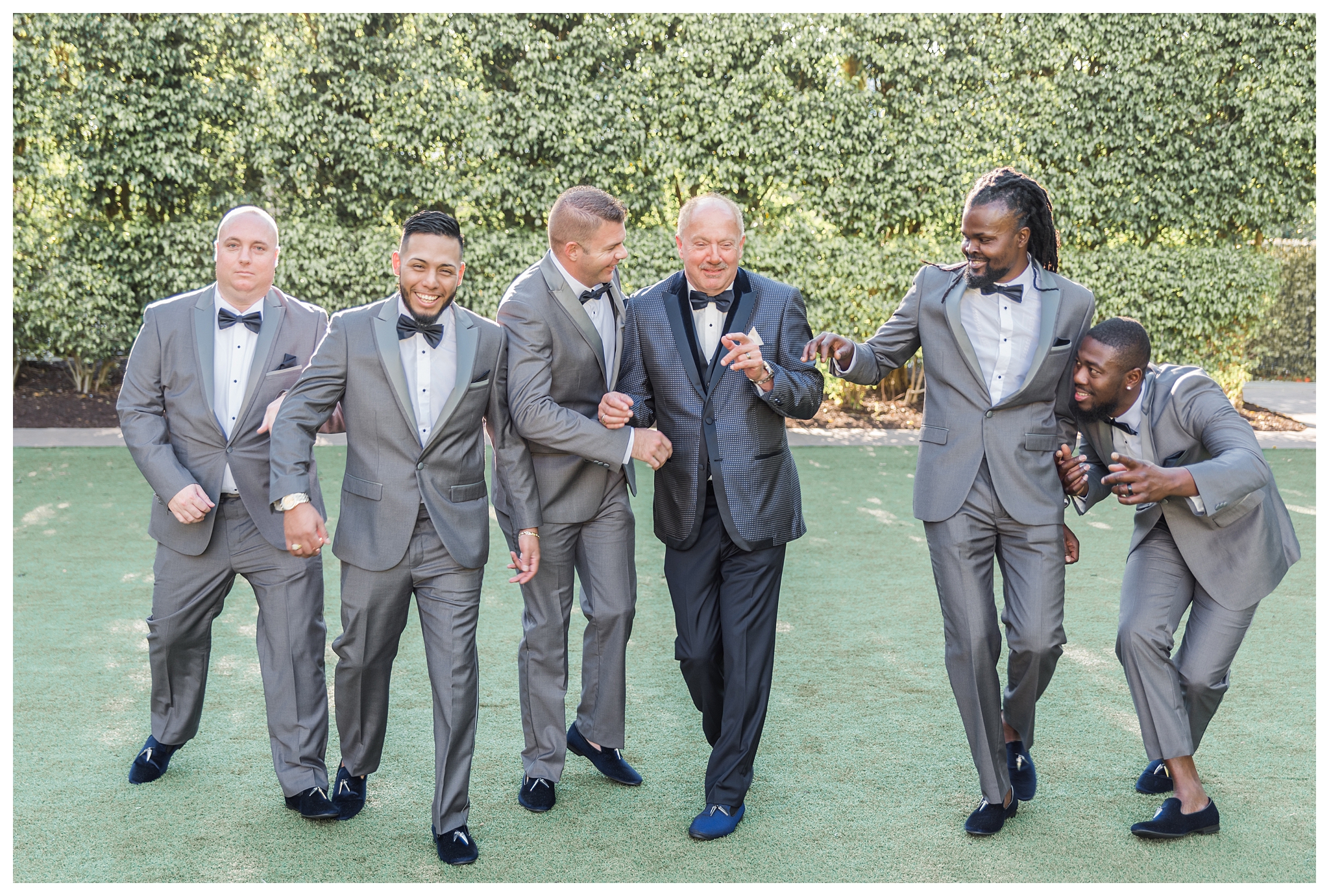 Groom with his groomsmen, navy and grey suits at the Hyatt Regency Coconut Point by Jessica McCalla Photography.